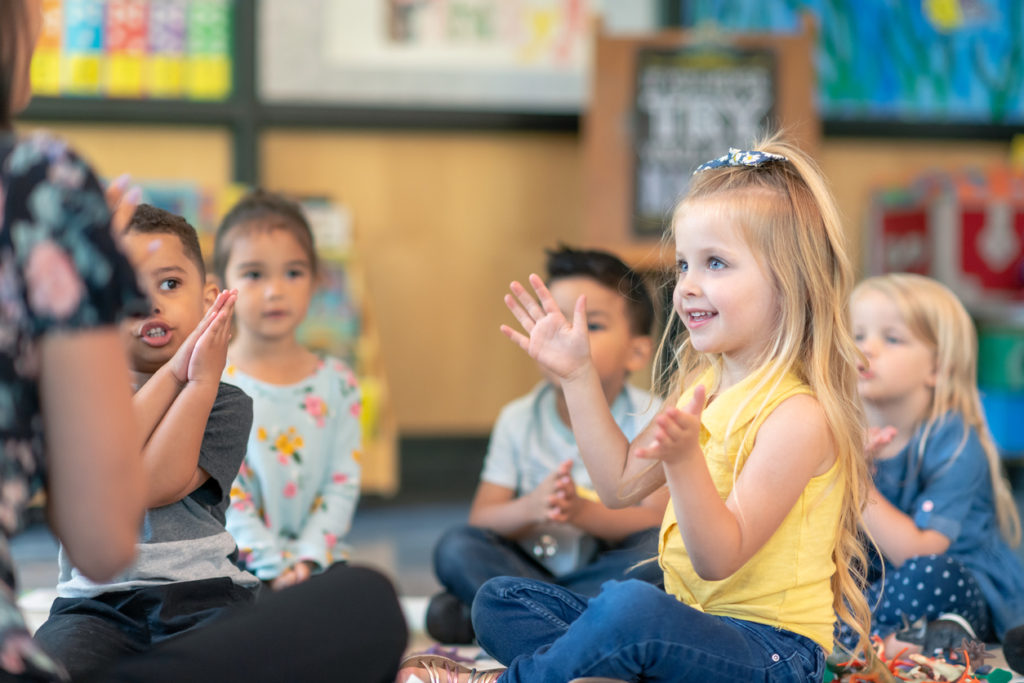 Multi-ethnic group of preschool students in class